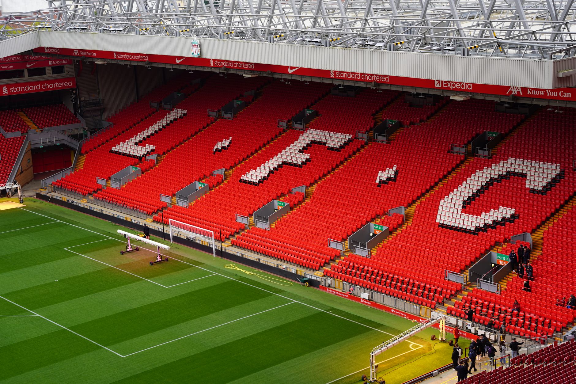 View of Anfield Stadium seating with prominent LFC letters. Perfect capture of iconic Liverpool FC venue.